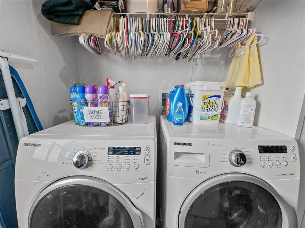 303 Mesa Ridge Decatur, TX 76234 - Photo 18 of 21 a utility room with dryer and washer