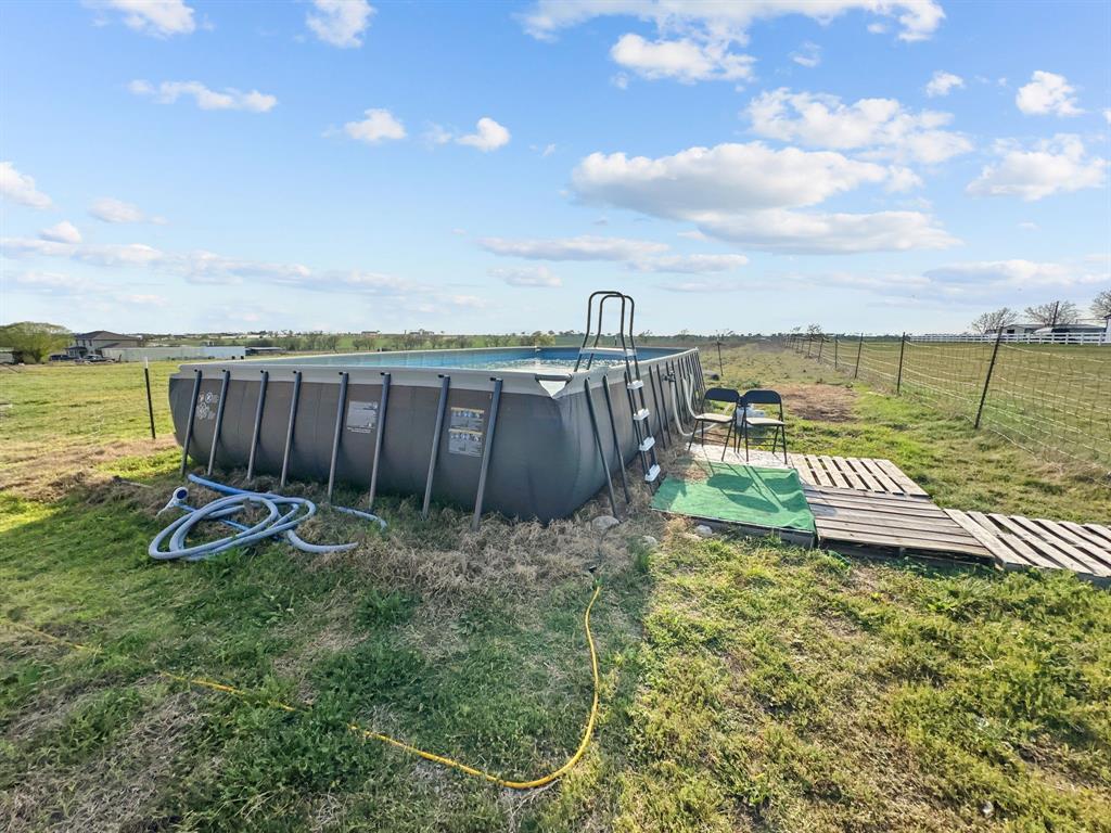 303 Mesa Ridge Decatur, TX 76234 - Photo 21 of 21 a view of a lake with a yard