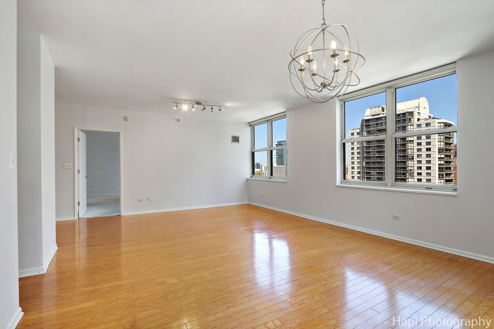 21 West Chestnut Street, Unit 1509 Chicago, IL 60610 - Photo 11 of 34 a view of an entryway with wooden floor