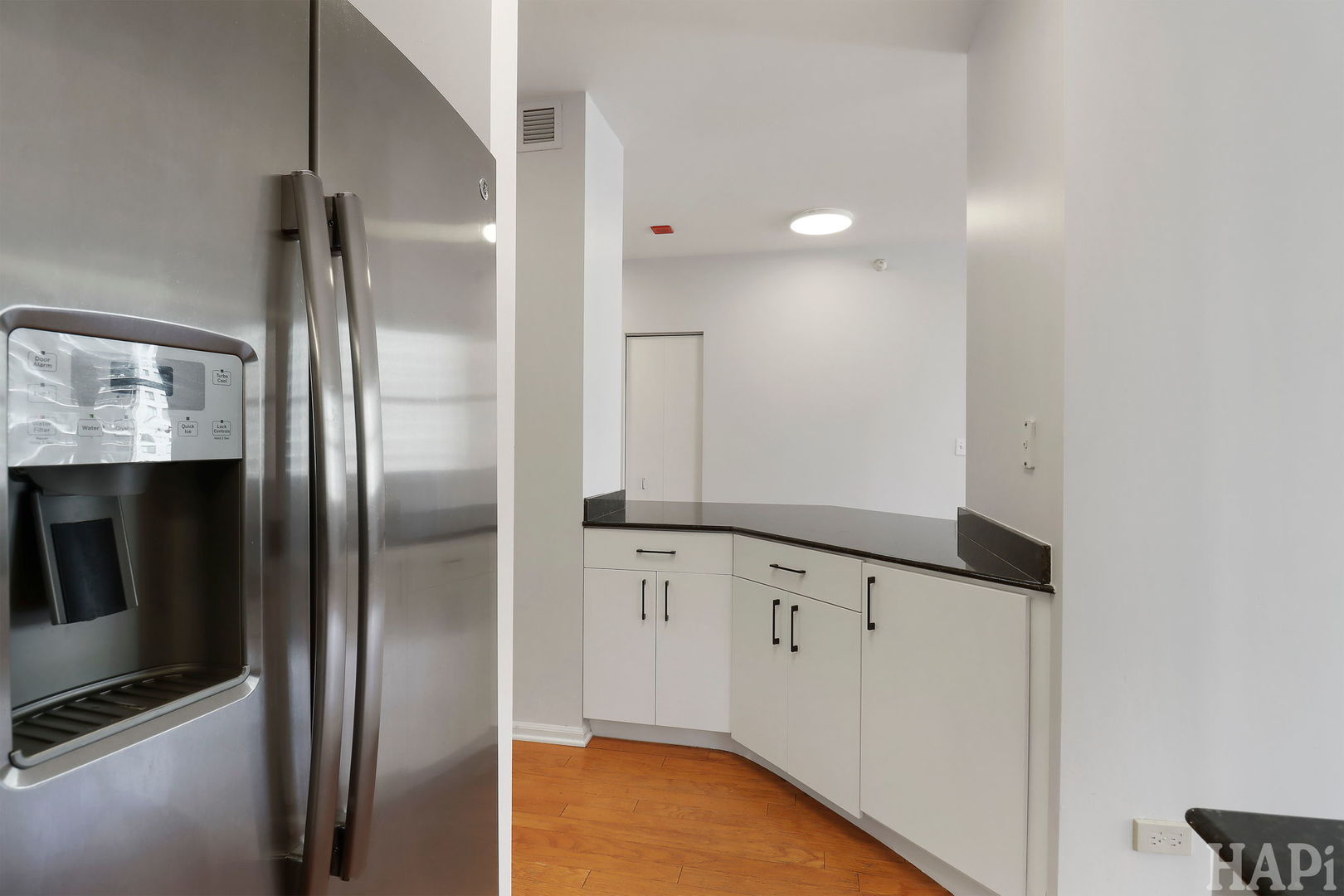 21 West Chestnut Street, Unit 1509 Chicago, IL 60610 - Photo 15 of 34 a view of kitchen with refrigerator