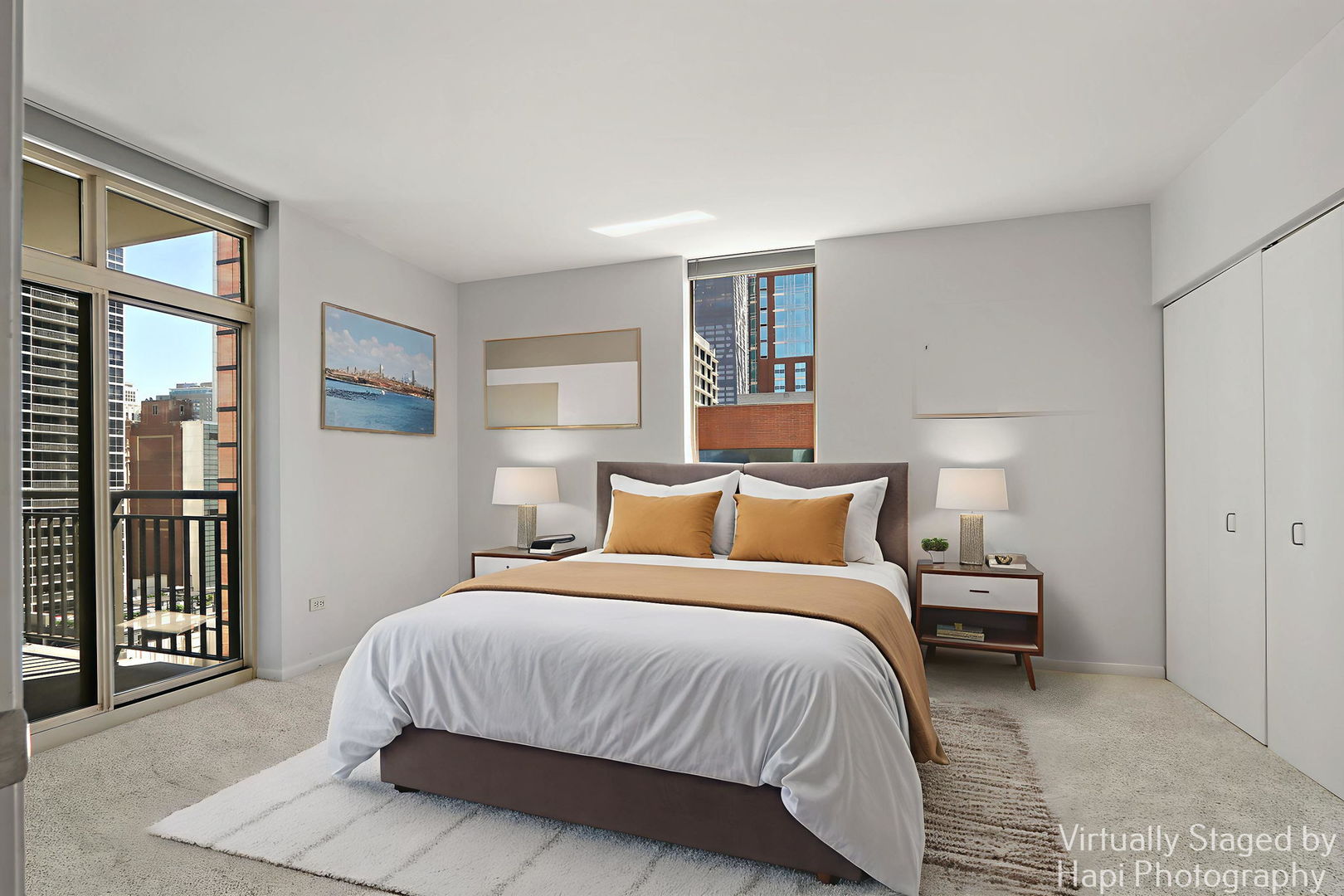 21 West Chestnut Street, Unit 1509 Chicago, IL 60610 - Photo 19 of 34 a bedroom with a large bed and a window