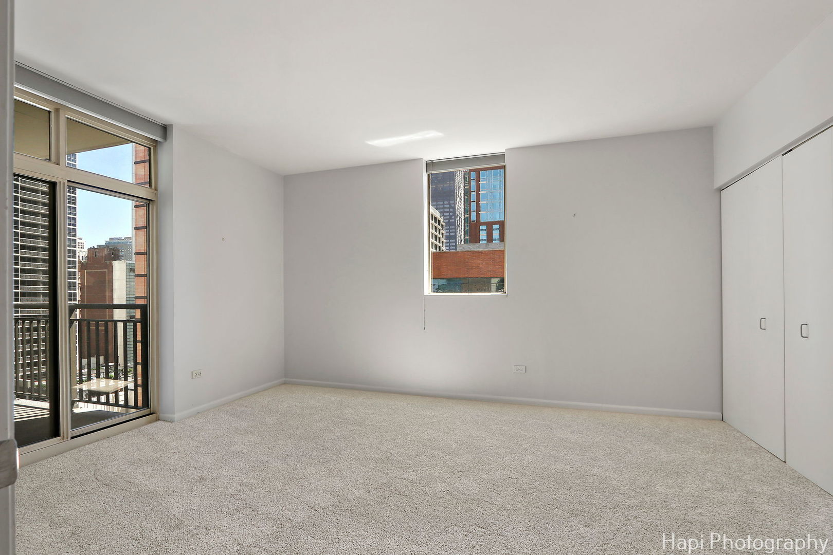 21 West Chestnut Street, Unit 1509 Chicago, IL 60610 - Photo 20 of 34 an empty room with windows