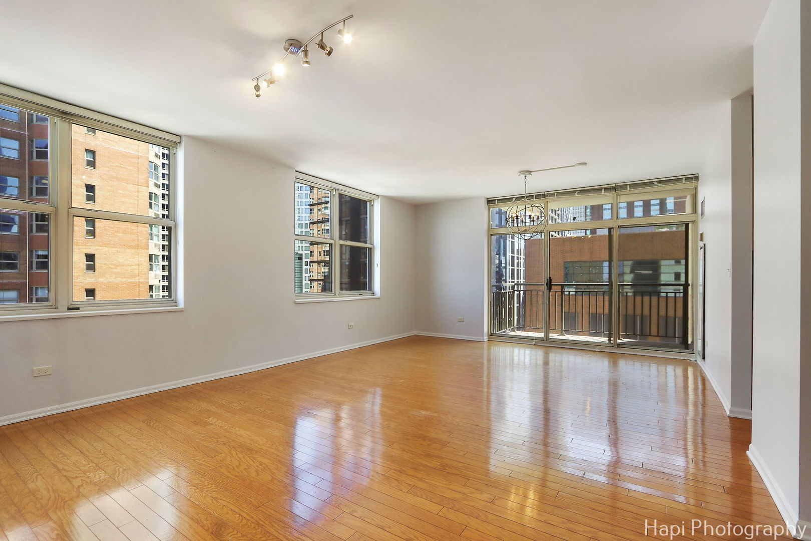 21 West Chestnut Street, Unit 1509 Chicago, IL 60610 - Photo 8 of 34 a view of an empty room with glass door