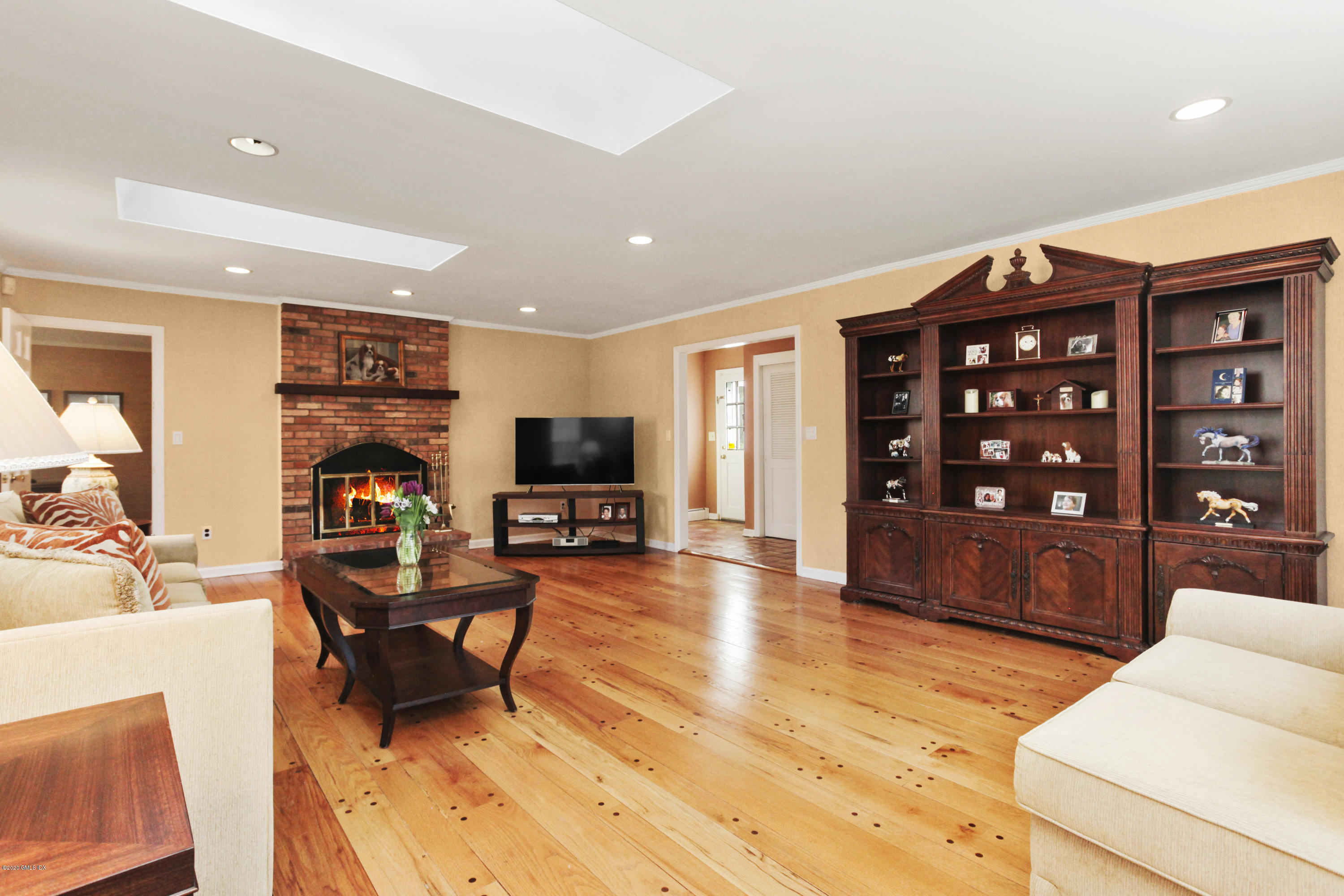 31 Horseshoe Road Cos Cob, CT 06807 - Photo 12 of 34 family room facing fp long