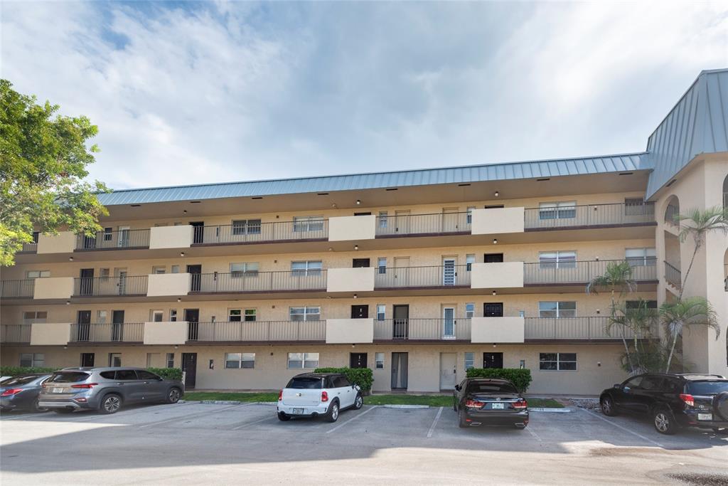 6061 North Falls Cir Drive, Unit 102 Lauderhill, FL 33319 - Photo 3 of 26 a building view
