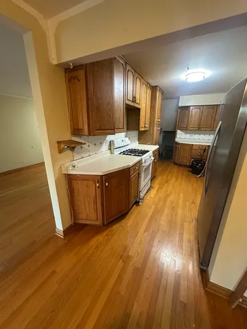 a view of kitchen with utility room