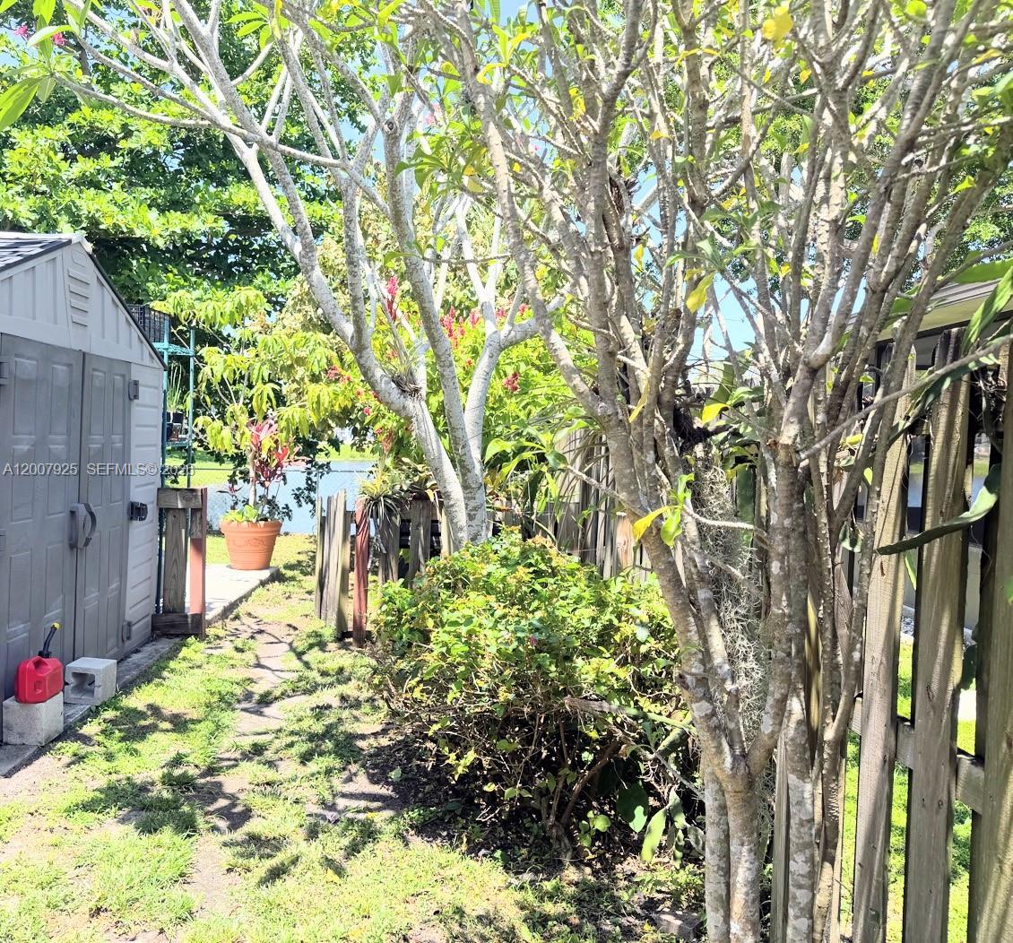 13541 Southwest 10th Place Davie, FL 33325 - Photo 19 of 20 a view of a backyard of the house