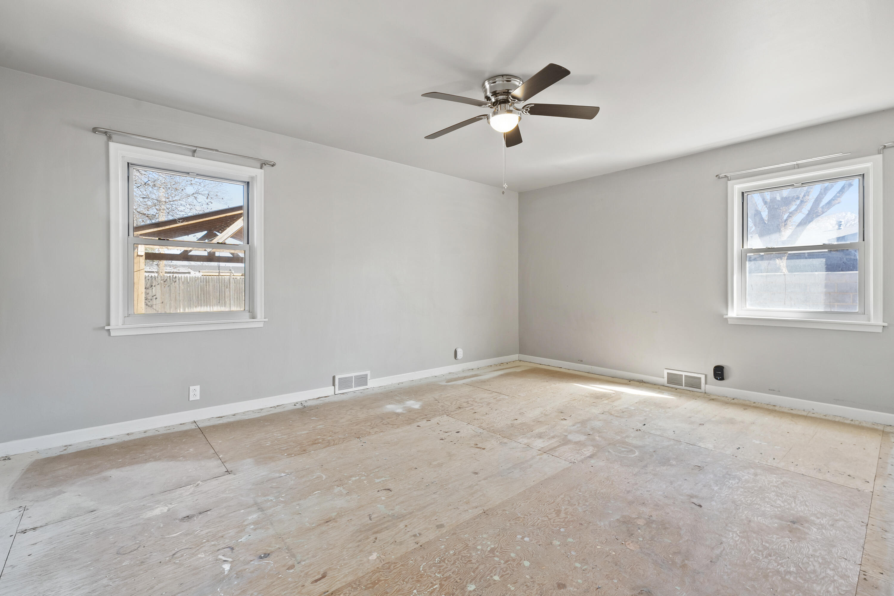 1201 8th Street Shallowater, TX 79363 - Photo 13 of 20 a view of an empty room with a window