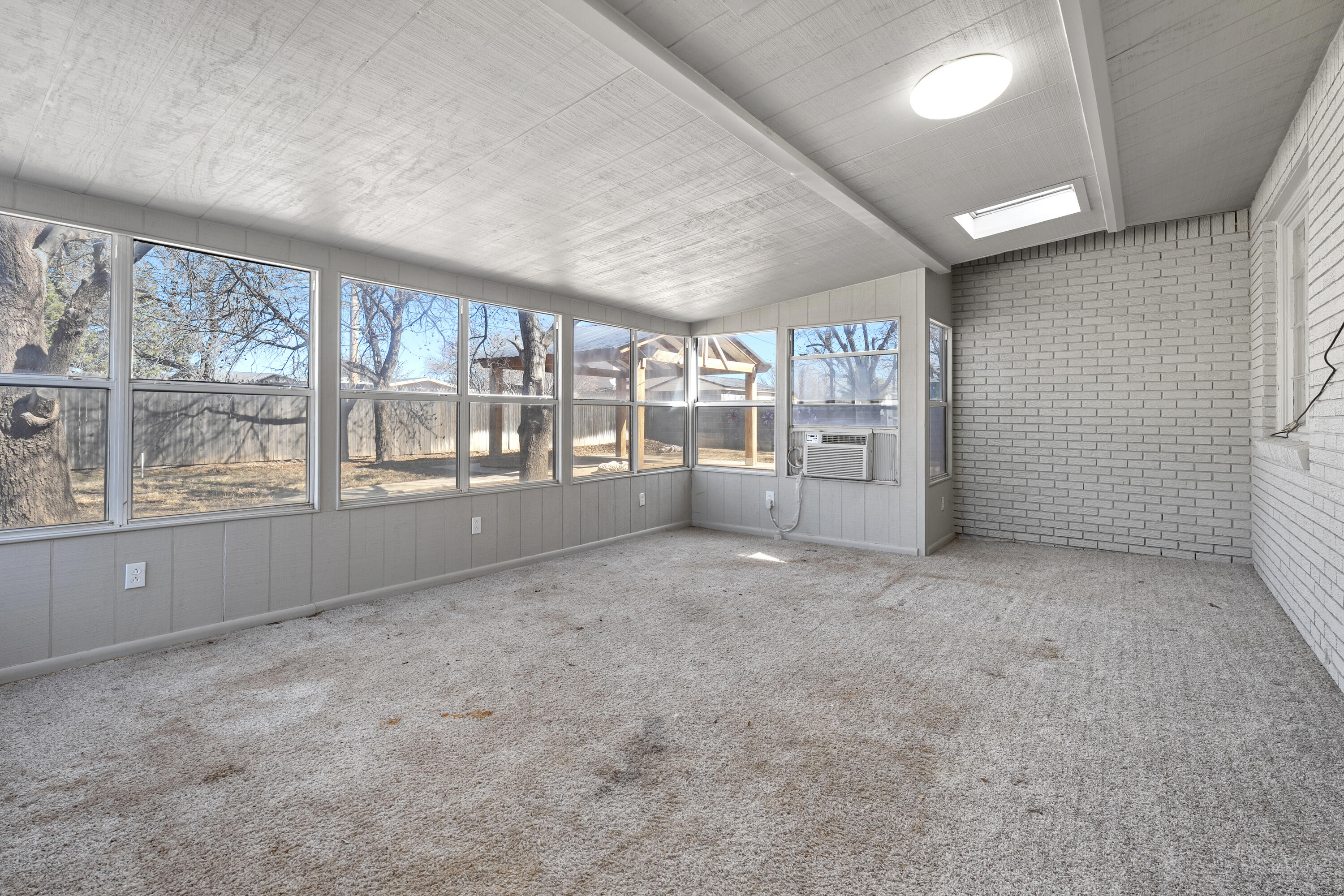 1201 8th Street Shallowater, TX 79363 - Photo 16 of 20 a view of an empty room with a window