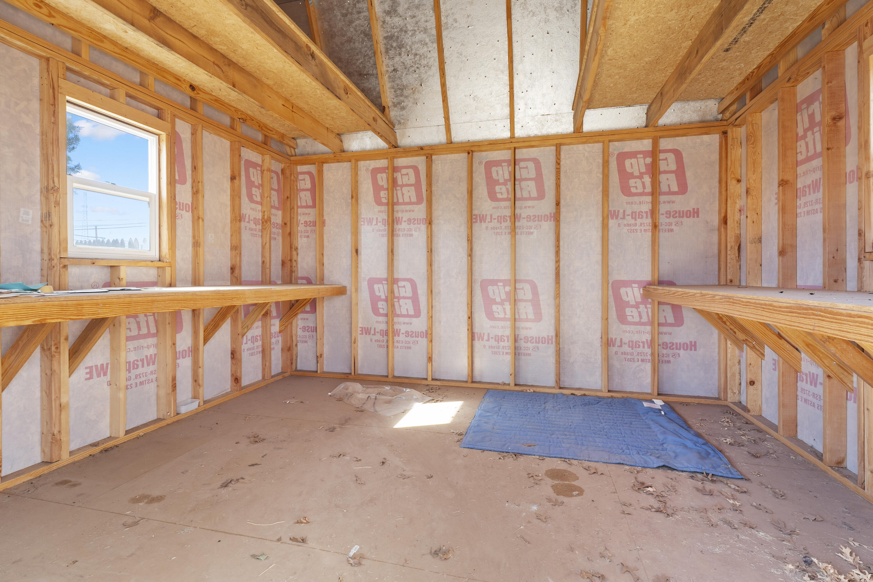 1201 8th Street Shallowater, TX 79363 - Photo 19 of 20 a view of an empty room with a window