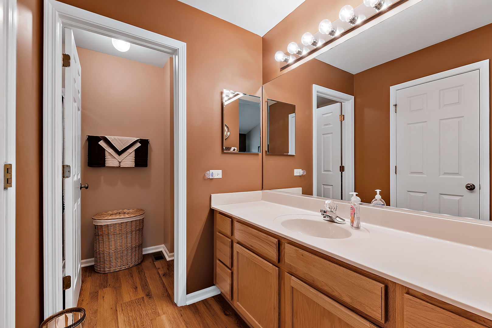 2926 Rutland Circle Naperville, IL 60564 - Photo 5 of 9 a en suite bathroom with a granite countertop sink toilet and mirror