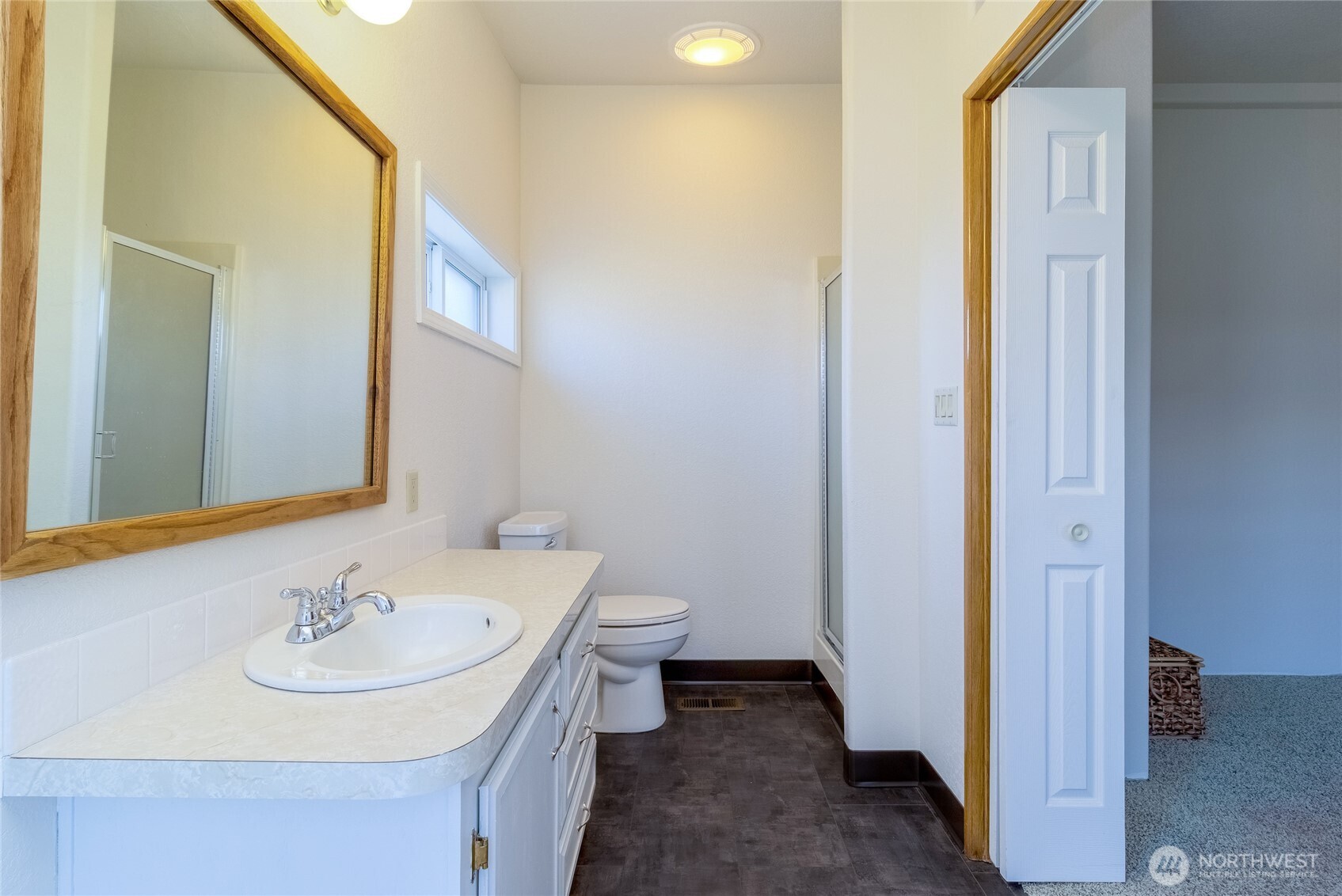 1312 Rancho Villa Walla Walla, WA 99362 - Photo 14 of 22 a bathroom with a sink and a mirror