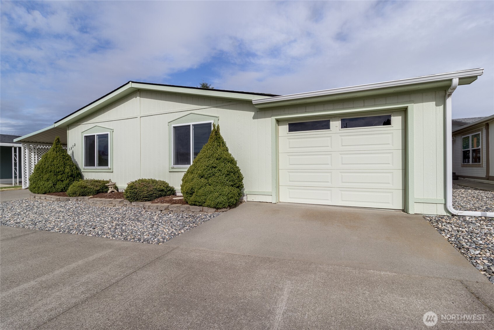 1312 Rancho Villa Walla Walla, WA 99362 - Photo 2 of 22 a view of a house with a outdoor space