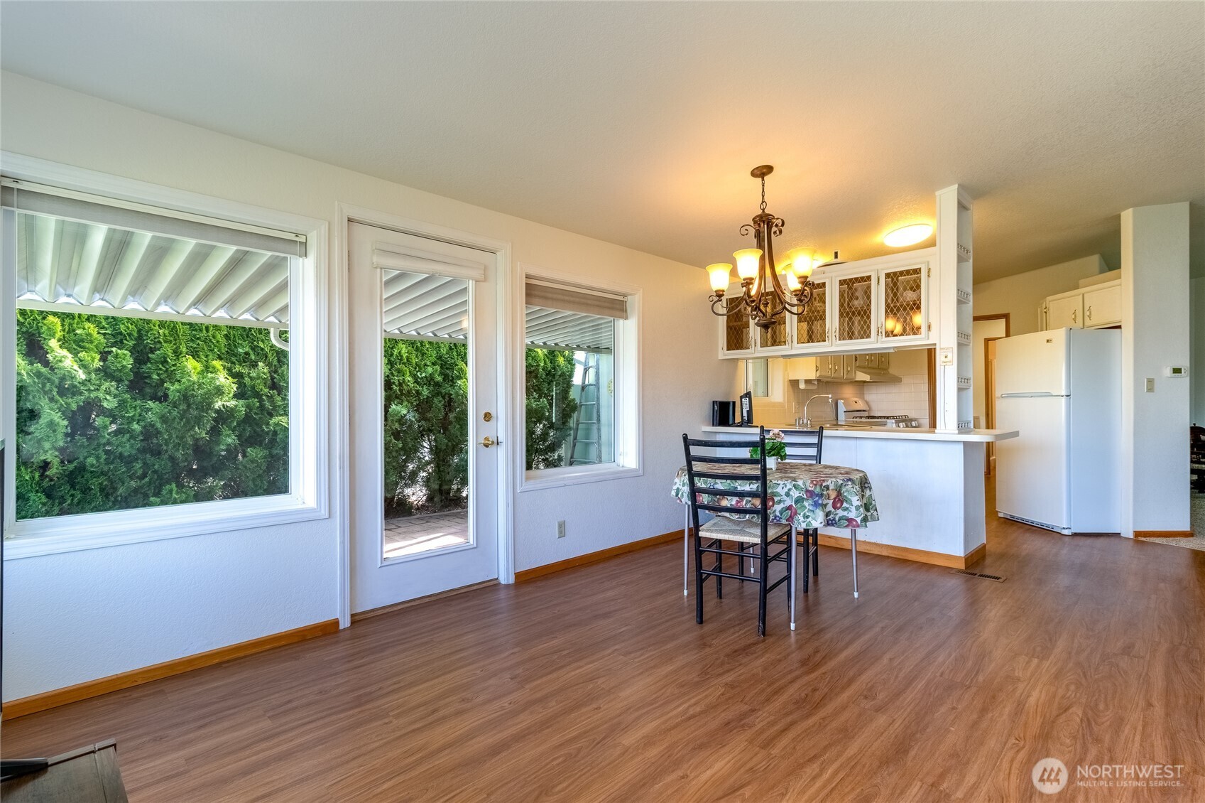 1312 Rancho Villa Walla Walla, WA 99362 - Photo 5 of 22 a dining room with furniture window and wooden floor