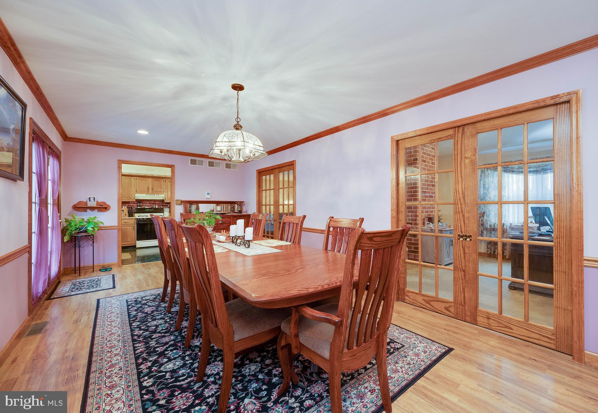 1109 Tuckerton Road Reading, PA 19605 - Photo 11 of 36 Large dining room with pocket doors