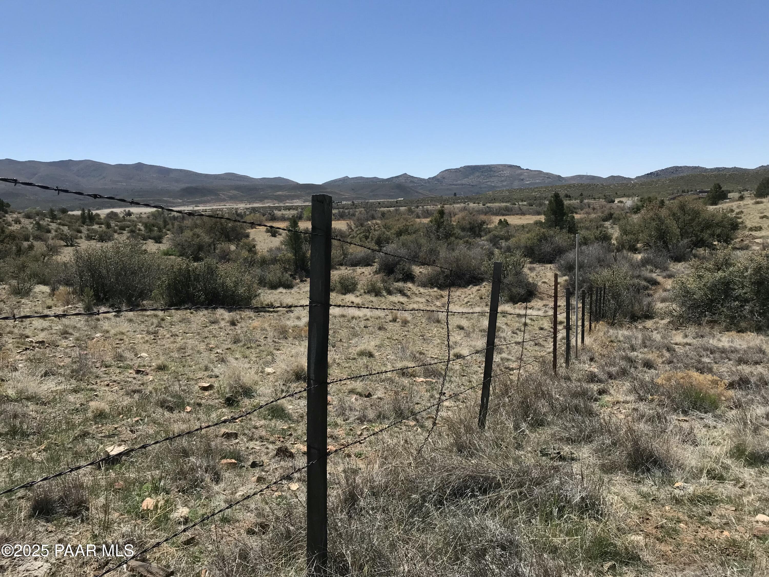 18351 Peeples Valley Road Peeples Valley, AZ 86332 - Photo 13 of 19 a view of a mountain with a yard