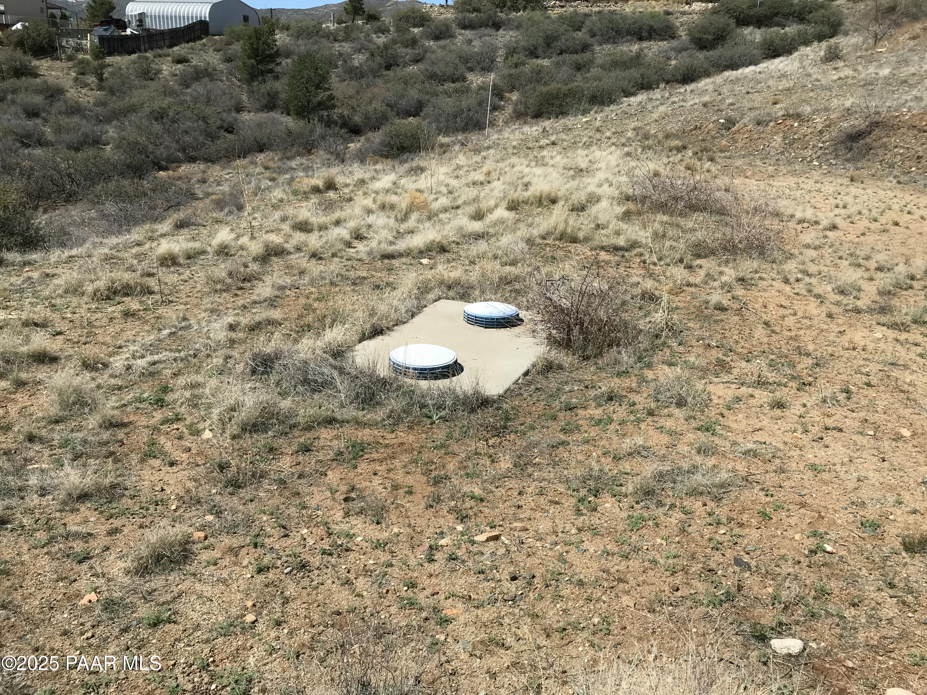 18351 Peeples Valley Road Peeples Valley, AZ 86332 - Photo 14 of 19 a view of a backyard of a house