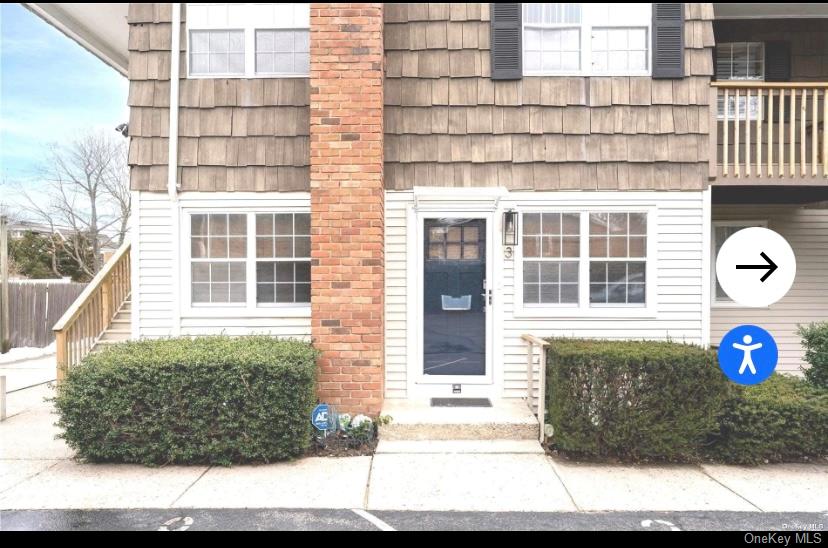 40 Canoe Place Road, Unit 3 Hampton Bays, NY 11946 - Photo 4 of 4 a front view of a building