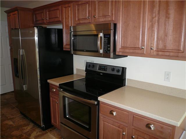 1357 Gen George Patton Road, Unit 1357 Nashville, TN 37221 - Photo 7 of 17 Stainless Appliances and Tons of Custom Cabinets.