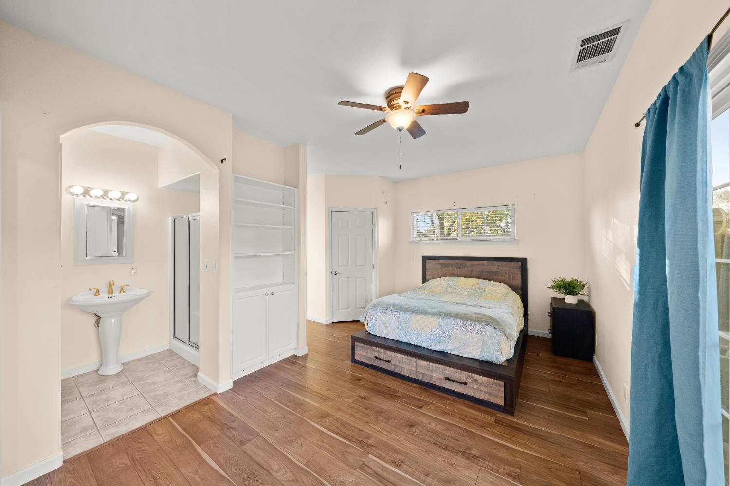 5001 Boyd Drive Carmichael, CA 95608 - Photo 11 of 49 a spacious bedroom with a bed and a mirror