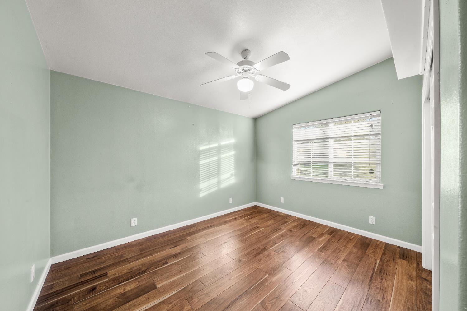 5001 Boyd Drive Carmichael, CA 95608 - Photo 17 of 49 a view of wooden floor and windows in a room