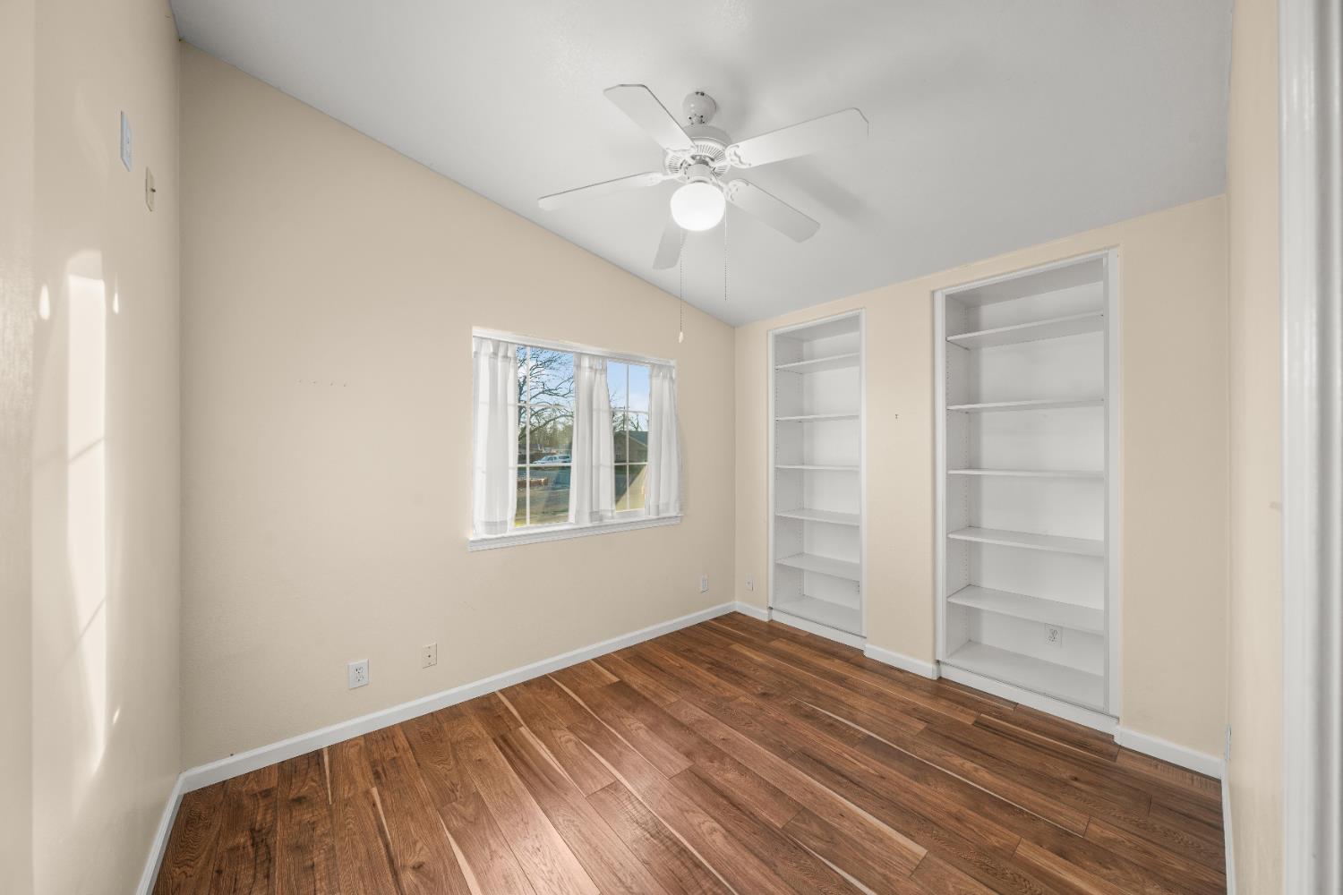 5001 Boyd Drive Carmichael, CA 95608 - Photo 20 of 49 wooden floor in an empty room with a window