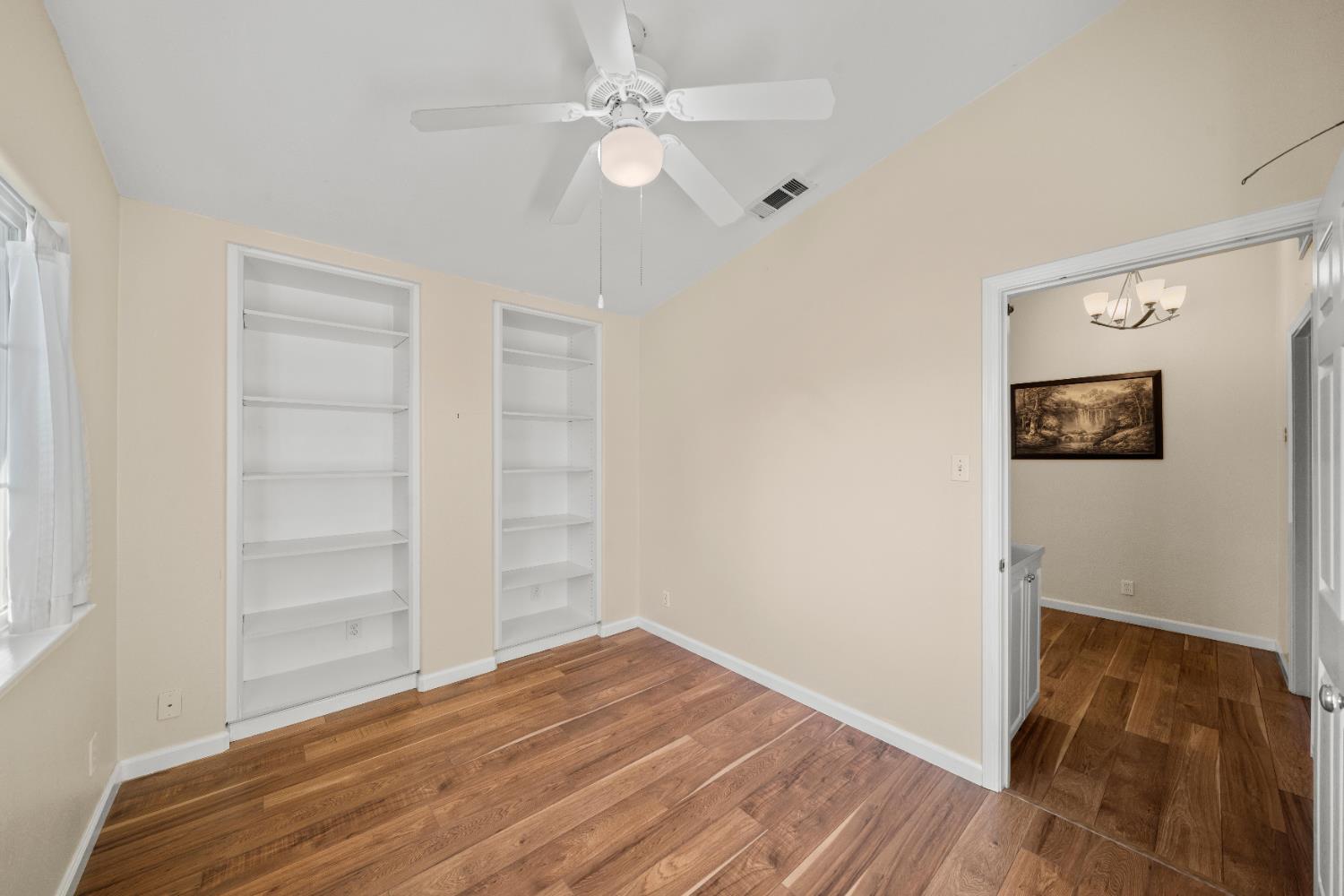 5001 Boyd Drive Carmichael, CA 95608 - Photo 21 of 49 a view of empty room with wooden floor