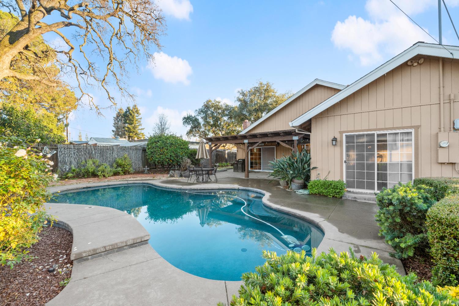 5001 Boyd Drive Carmichael, CA 95608 - Photo 30 of 49 a view of a swimming pool with sitting area