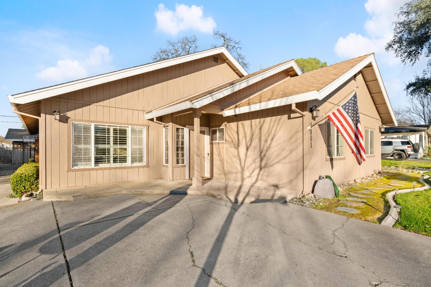 5001 Boyd Drive Carmichael, CA 95608 - Photo 48 of 49 a view of a house with a backyard and a window