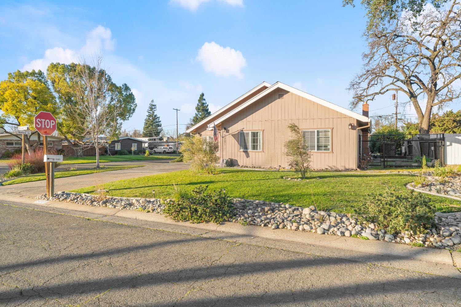 5001 Boyd Drive Carmichael, CA 95608 - Photo 49 of 49 a front view of a house with a yard