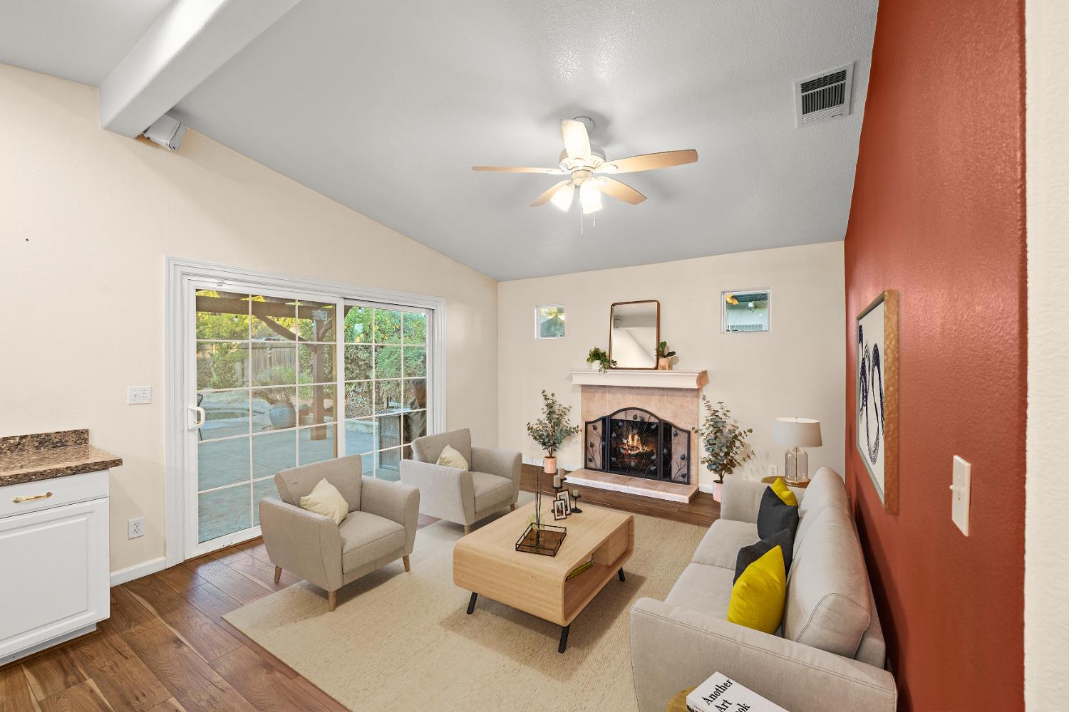 5001 Boyd Drive Carmichael, CA 95608 - Photo 8 of 49 a living room with furniture and a fireplace