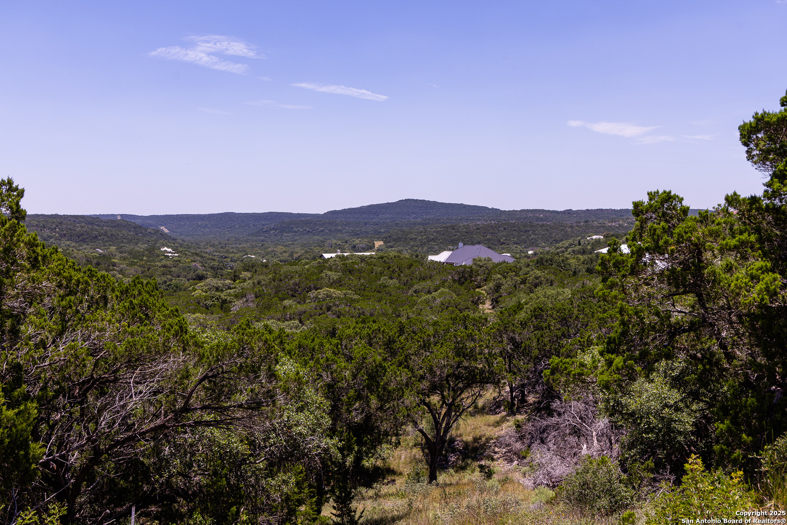 Tbd Pr 177 Helotes, TX 78023 - Photo 8 of 34 a view of a town with mountains in the background