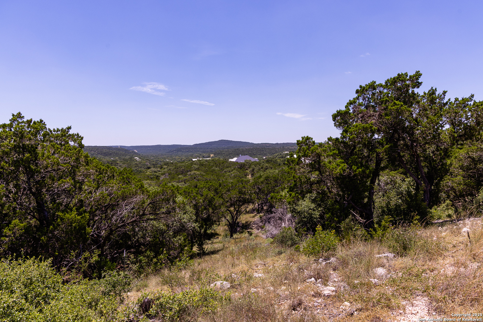 Tbd Pr 177 Helotes, TX 78023 - Photo 9 of 34 a view of a city with lush green forest