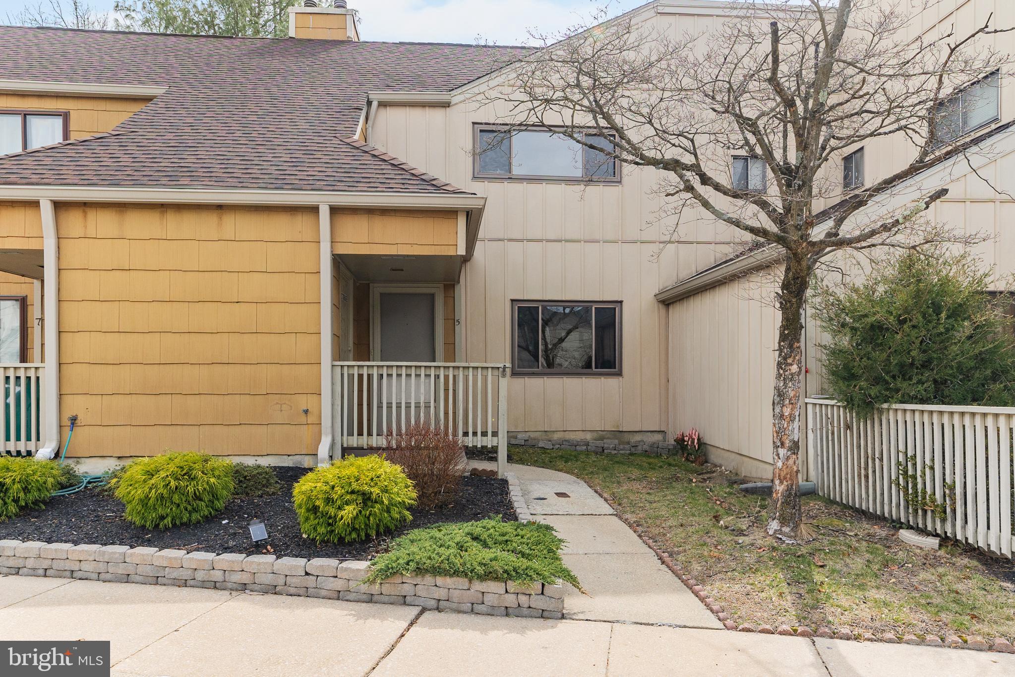 5 Dover Drive Lindenwold, NJ 08021 - Photo 1 of 28 a front view of a house with garden