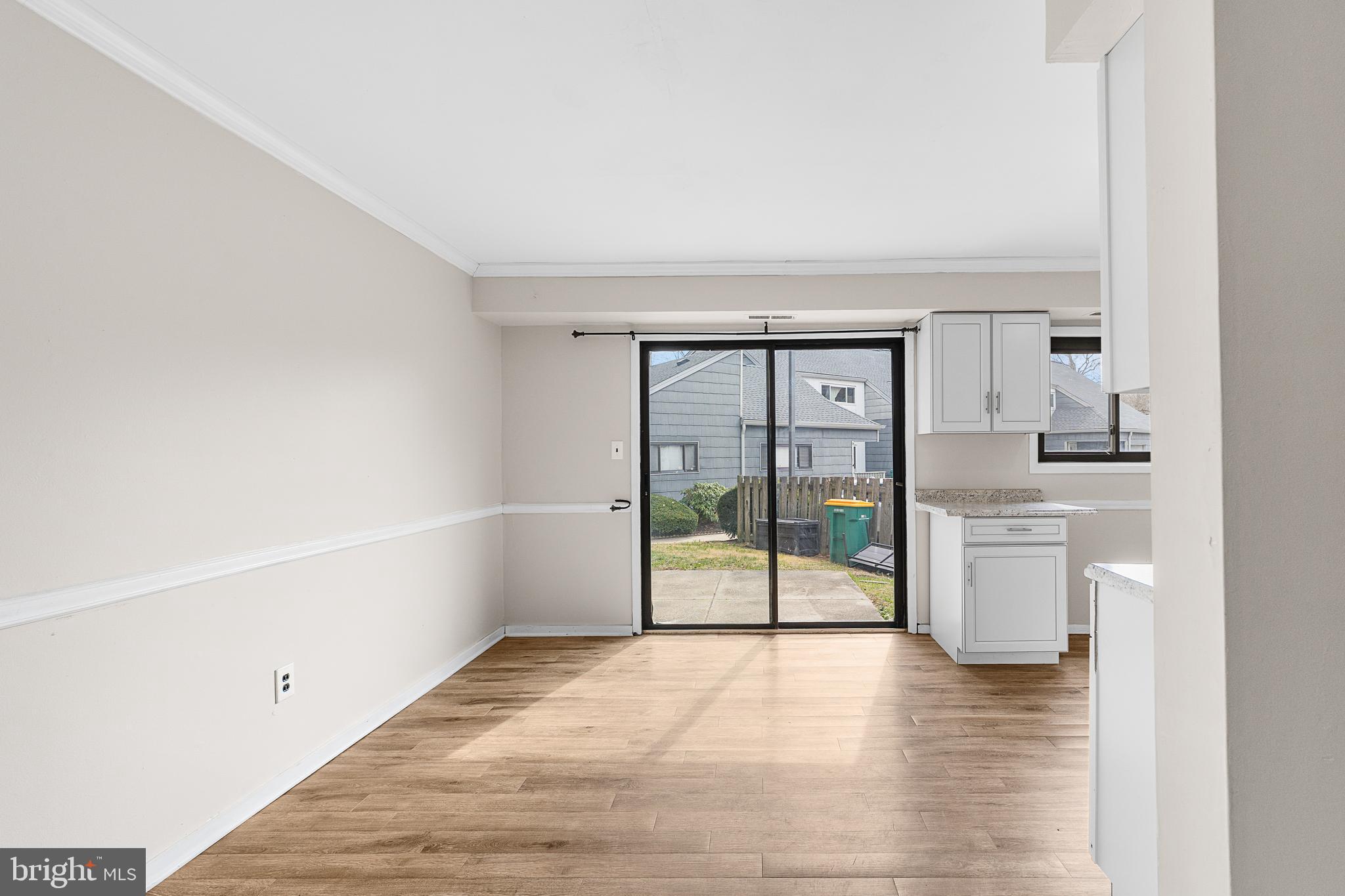 5 Dover Drive Lindenwold, NJ 08021 - Photo 12 of 28 a view of empty room with wooden floor and fan
