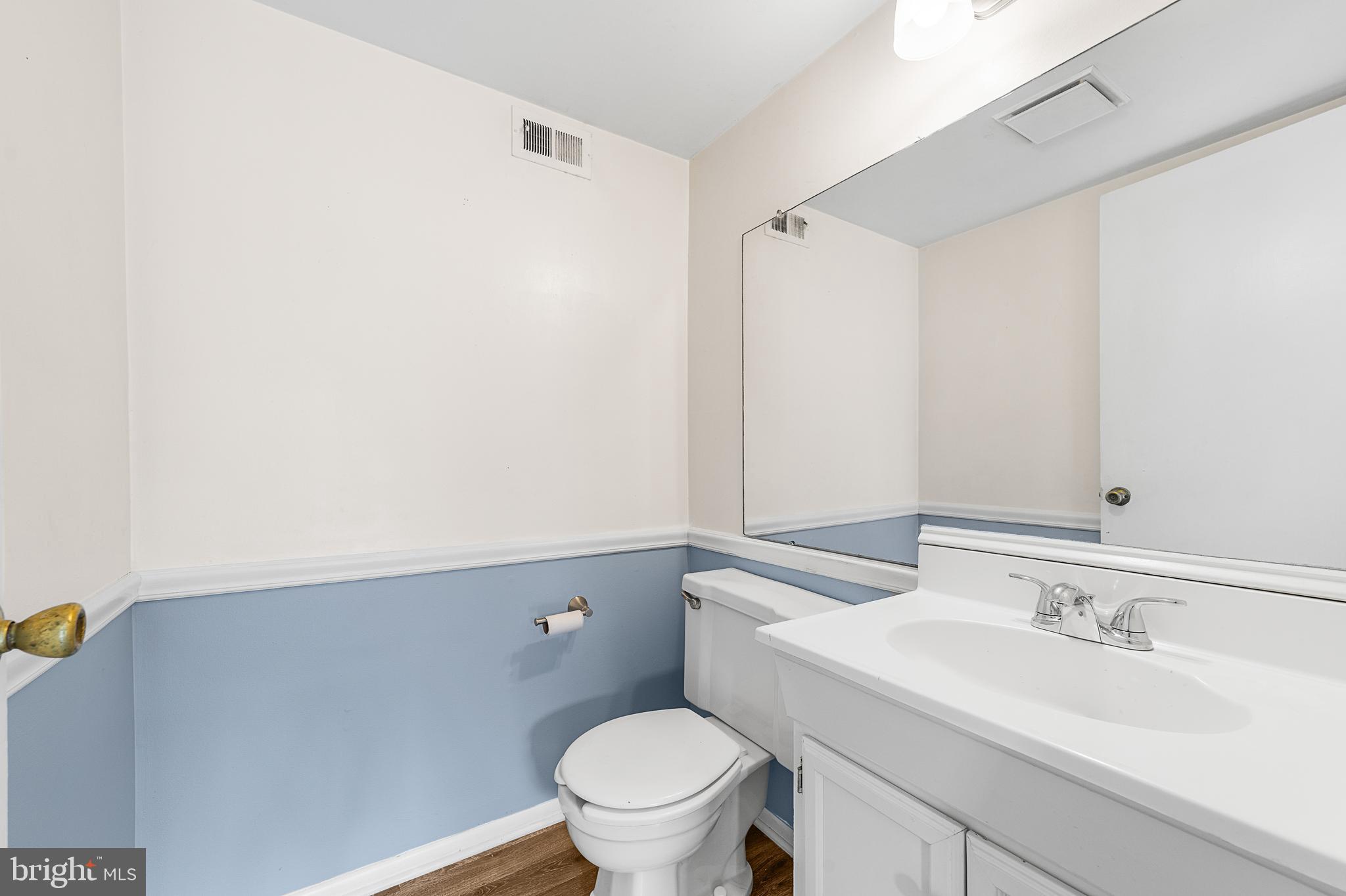 5 Dover Drive Lindenwold, NJ 08021 - Photo 17 of 28 a bathroom with a sink a toilet and a mirror