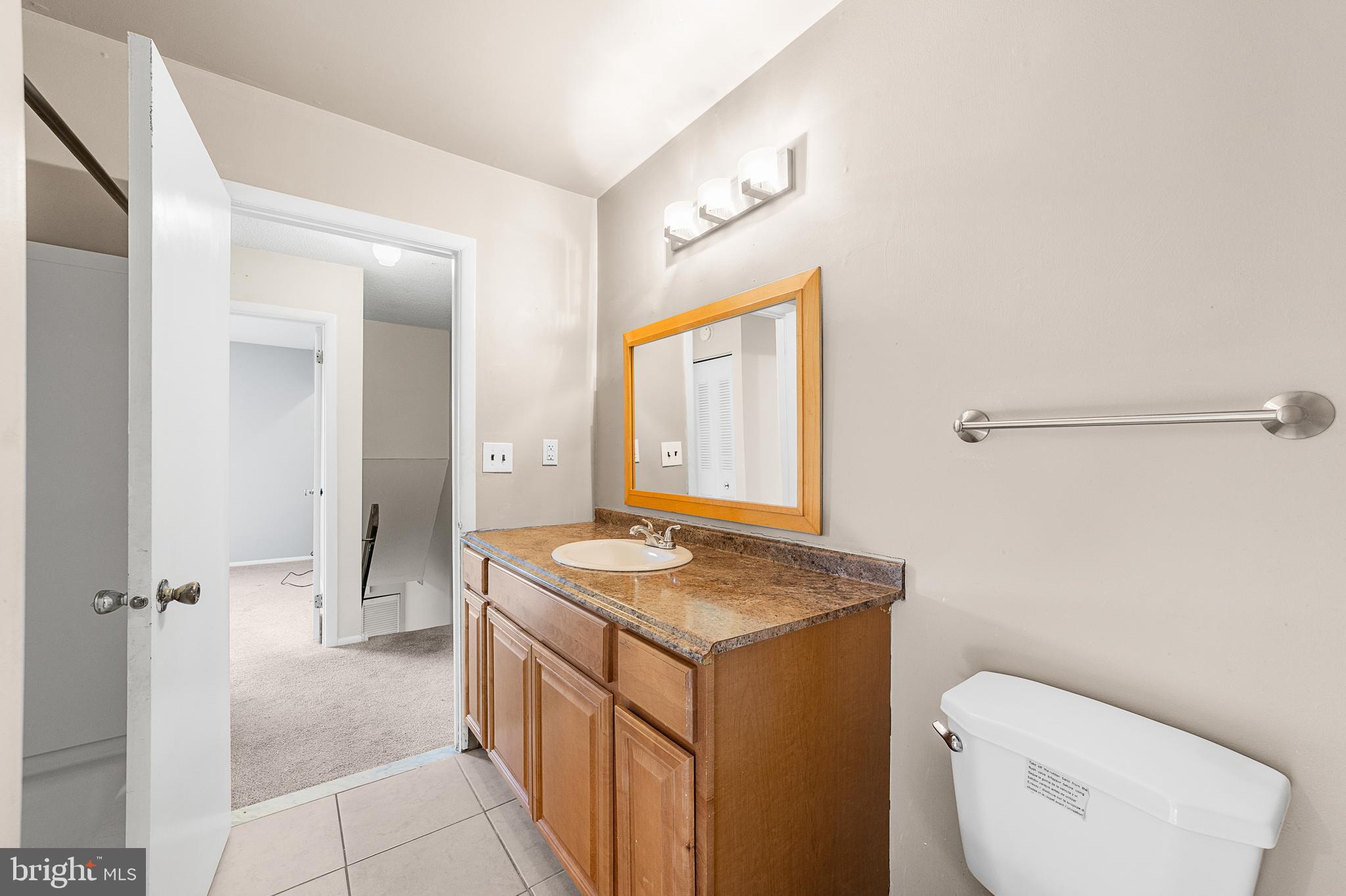 5 Dover Drive Lindenwold, NJ 08021 - Photo 21 of 28 a bathroom with a granite countertop sink a toilet and shower