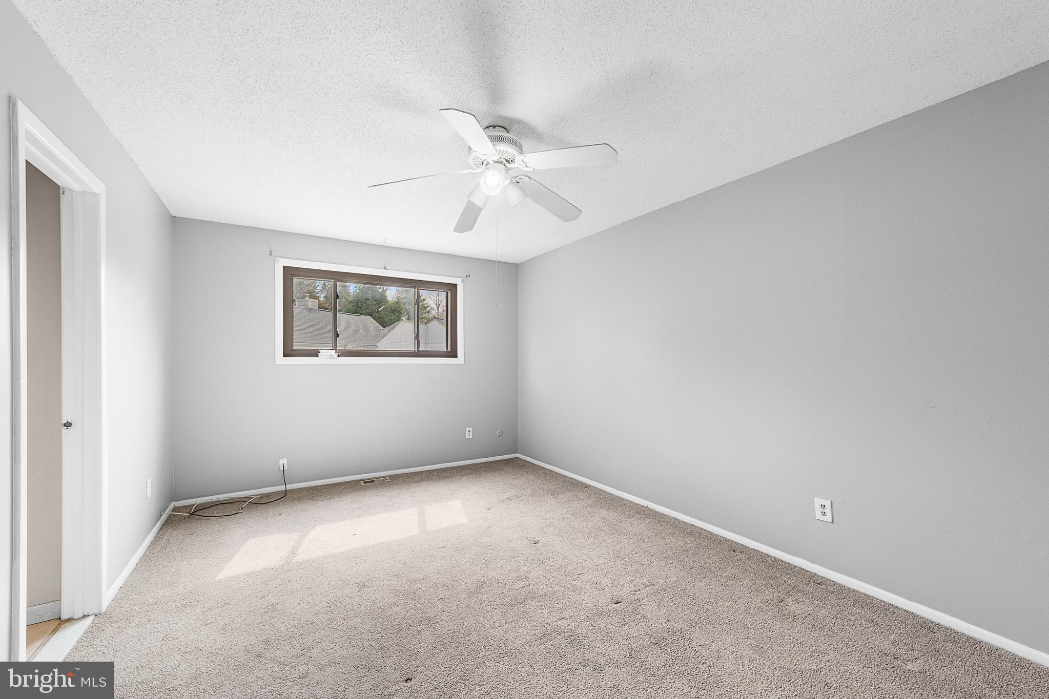 5 Dover Drive Lindenwold, NJ 08021 - Photo 23 of 28 an empty room with windows and fan