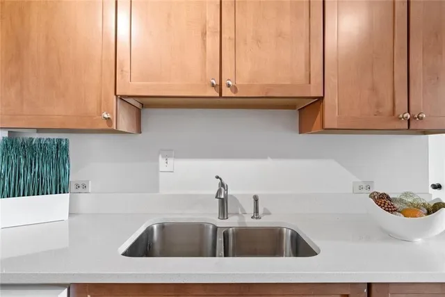 a bathroom with a sink and toilet