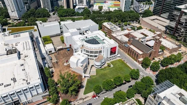 an aerial view of a house with outdoor space and street view