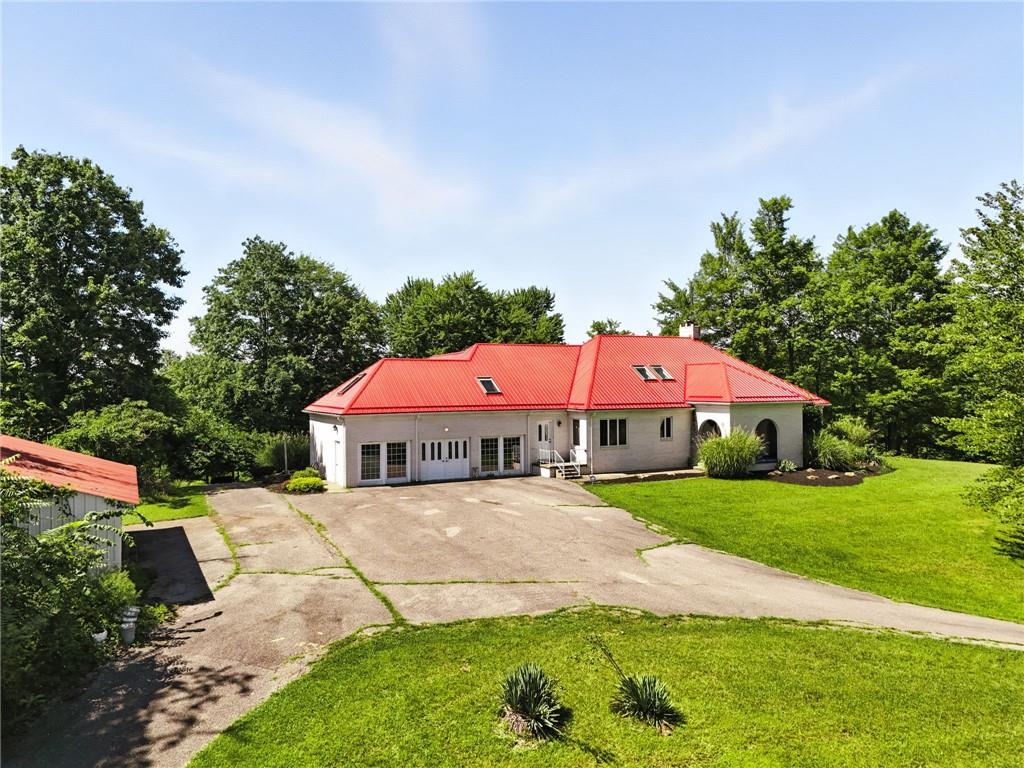 341 Paris Colliers Road Burgettstown, PA 15021 - Photo 2 of 37 a view of a house with a yard and sitting area