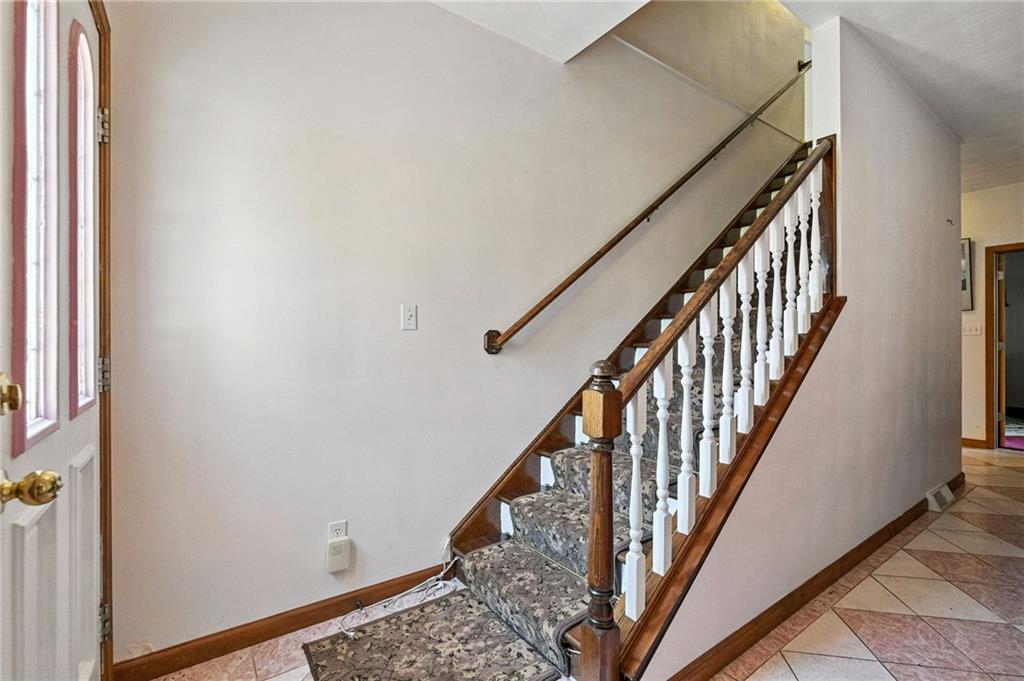 341 Paris Colliers Road Burgettstown, PA 15021 - Photo 9 of 37 a view of staircase with wooden floor and white walls