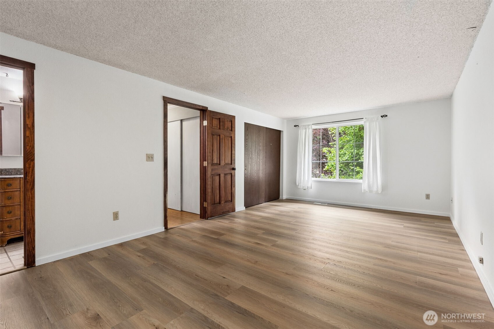 608 School Street Southeast Lacey, WA 98503 - Photo 13 of 26 an empty room with windows and closet