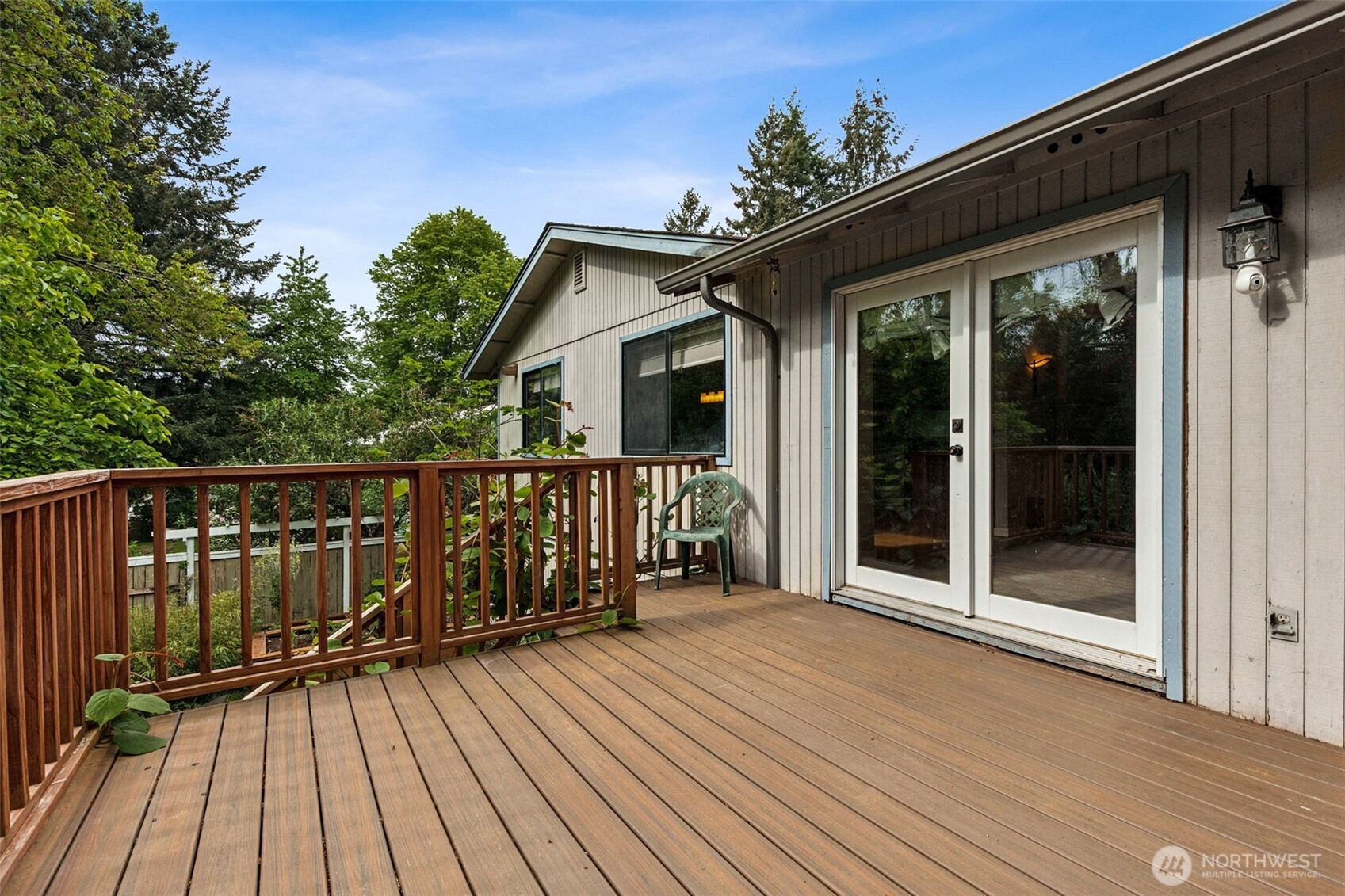 608 School Street Southeast Lacey, WA 98503 - Photo 22 of 26 a view of a house with wooden deck