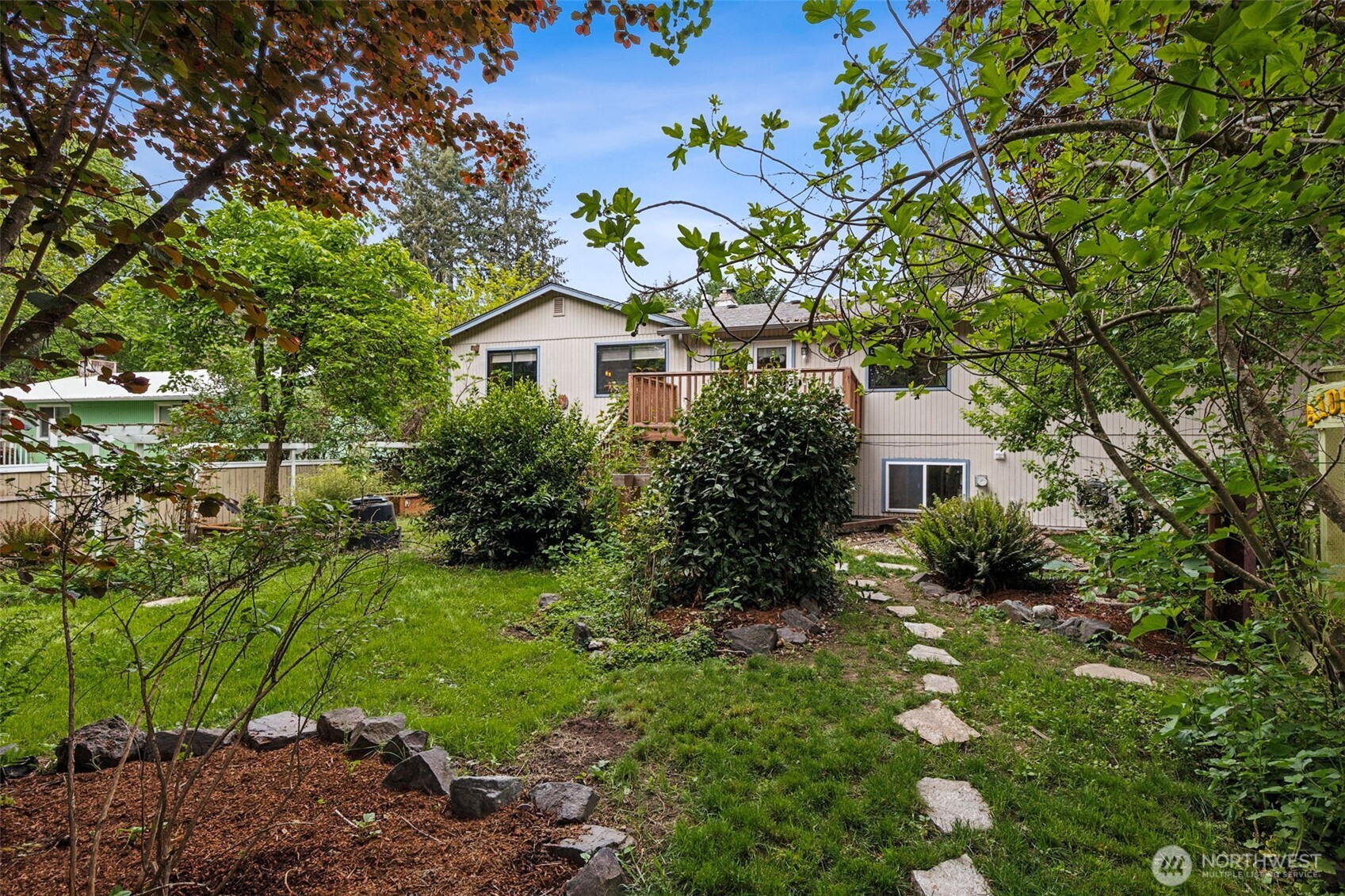608 School Street Southeast Lacey, WA 98503 - Photo 4 of 26 a front view of a house with a yard