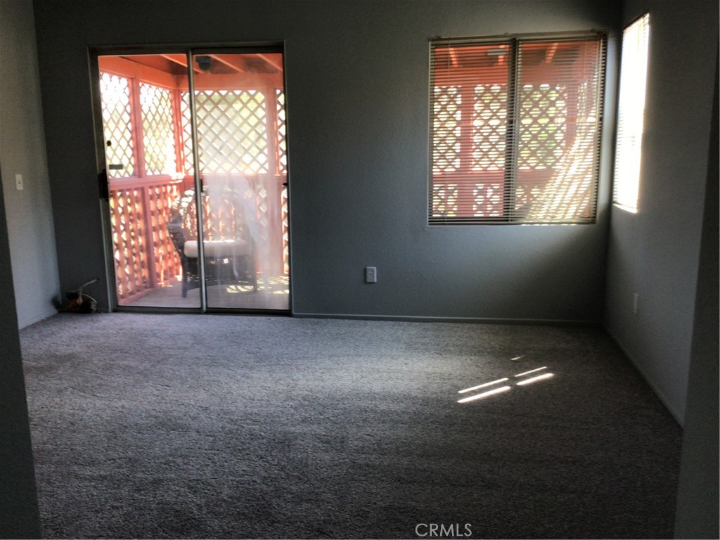 763 Anthirium Avenue Perris, CA 92571 - Photo 14 of 20 a view of empty room with windows