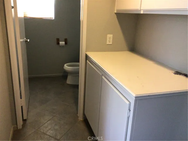 a view of bathroom with a sink and a toilet