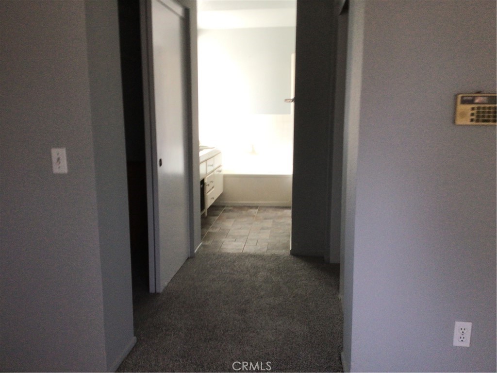 763 Anthirium Avenue Perris, CA 92571 - Photo 16 of 20 a view of a hallway