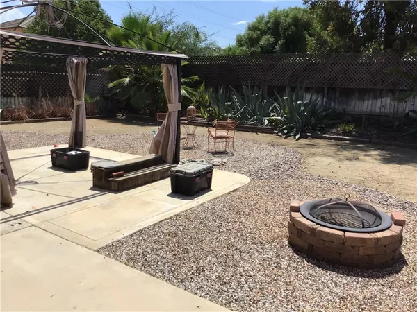 a view of swimming pool with a patio