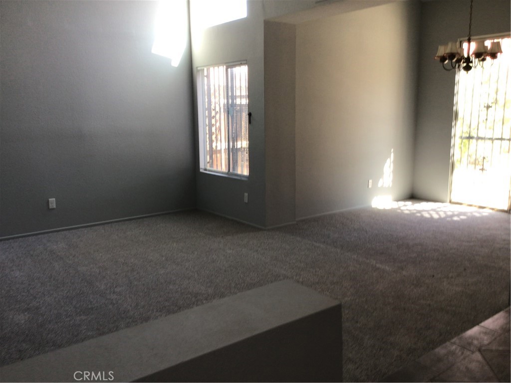 763 Anthirium Avenue Perris, CA 92571 - Photo 3 of 20 an empty room with windows